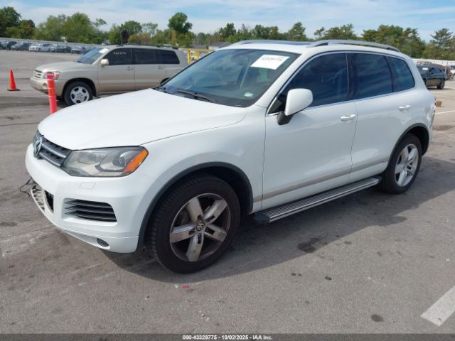 2012 VOLKSWAGEN TOUAREG WVGEF9BP0CD006943 Photo 1