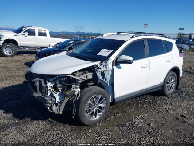 2018 TOYOTA RAV4 HYBRID JTMRJREV5JD234206 Photo 1