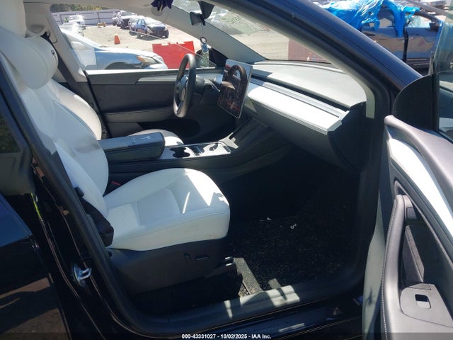 2023 TESLA MODEL Y 7SAYGDEE2PA196769 Photo 4