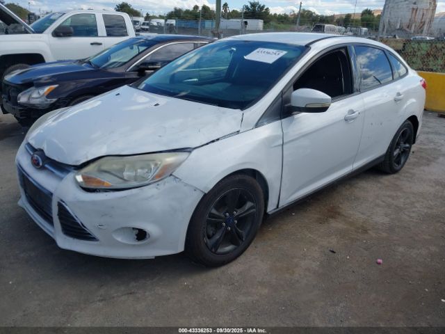 2014 FORD FOCUS 1FADP3F28EL349832 Photo 1