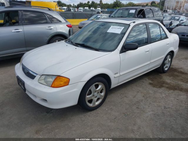 1999 MAZDA PROTEGE JM1BJ2218X0194066 Photo 1