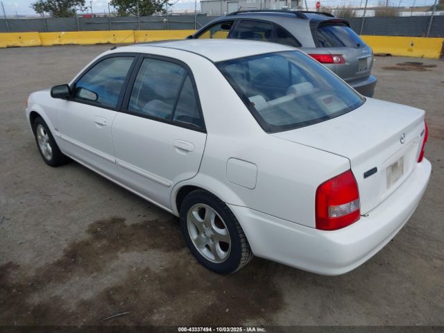 1999 MAZDA PROTEGE JM1BJ2218X0194066 Photo 2