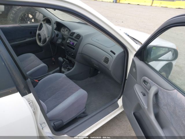 1999 MAZDA PROTEGE JM1BJ2218X0194066 Photo 4