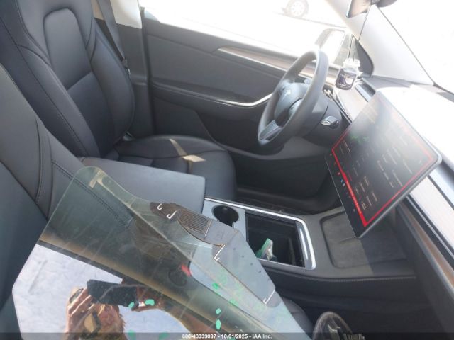 2023 TESLA MODEL Y 7SAYGDEE2PF791592 Photo 4