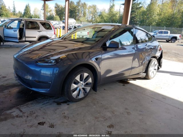 2023 TESLA MODEL Y 7SAYGDEE6PF886642 Photo 1