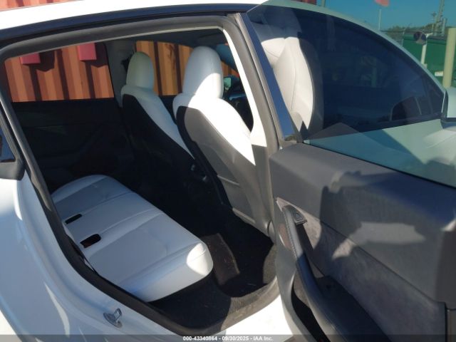 2023 TESLA MODEL Y 7SAYGDEF0PF811542 Photo 7