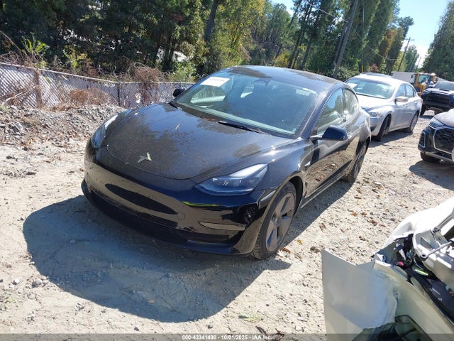 2023 TESLA MODEL 3 5YJ3E1EB8PF388590 Photo 1