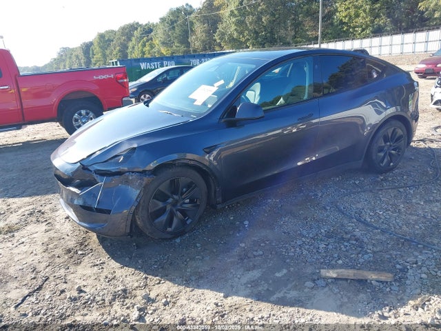 2024 TESLA MODEL Y 7SAYGDEE7RA294540 Photo 1