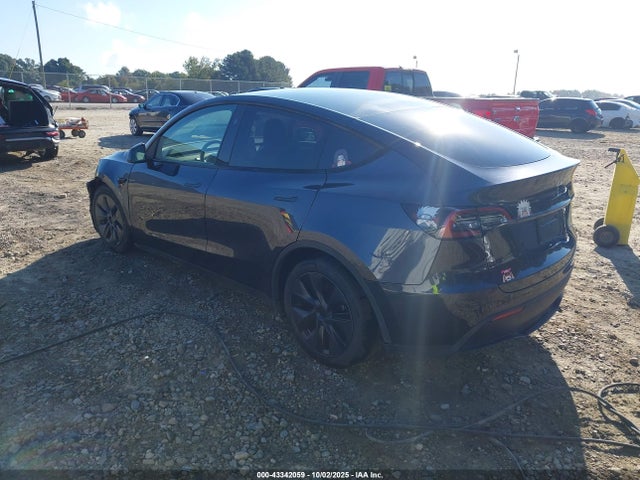 2024 TESLA MODEL Y 7SAYGDEE7RA294540 Photo 2