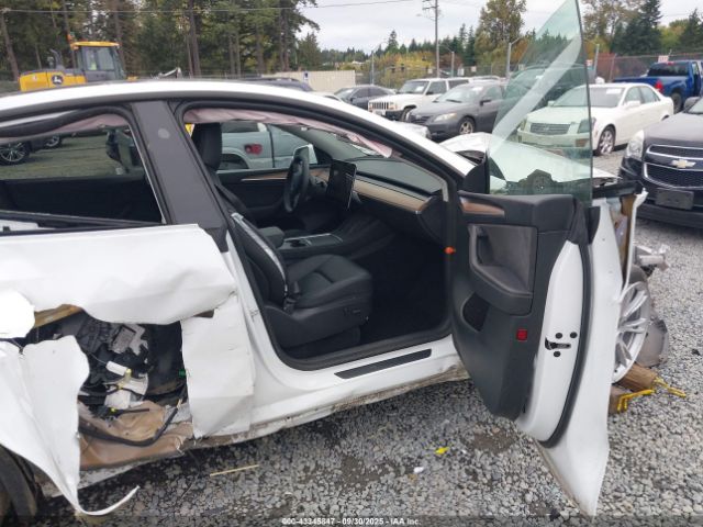 2023 TESLA MODEL Y 7SAYGAEE1PF860755 Photo 4