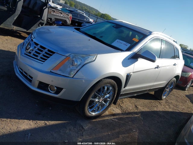 2013 CADILLAC SRX 3GYFNJE33DS559832 Photo 1