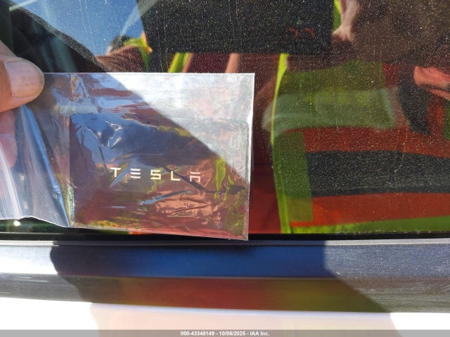 7SAYGAEE4RF106218 Tesla Model Y