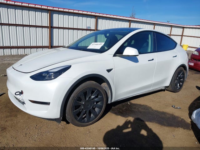 7SAYGAEE4RF106218 Tesla Model Y
