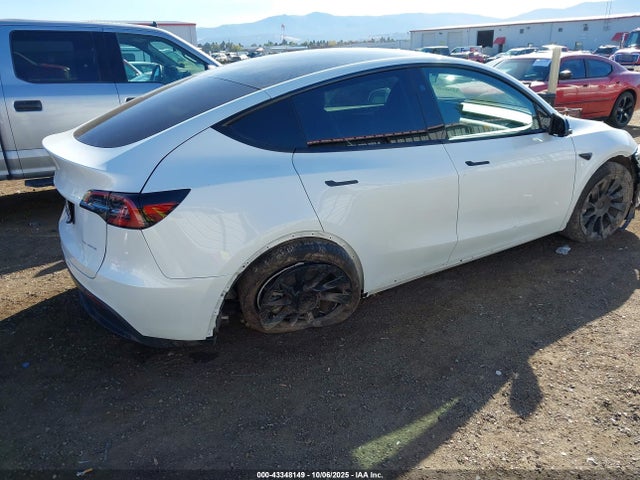 7SAYGAEE4RF106218 Tesla Model Y