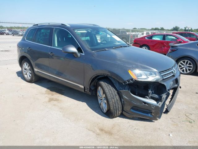 2014 VOLKSWAGEN TOUAREG WVGEF9BPXED009920