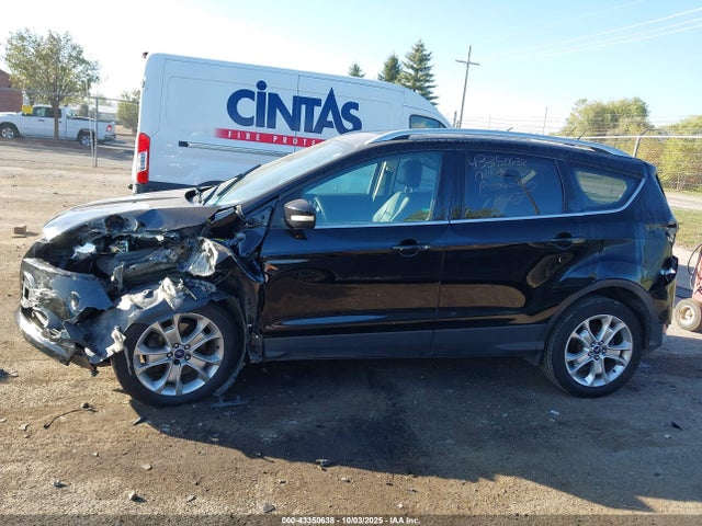2016 Ford Escape Titanium მანქანა იყიდება აუქციონზე, vin: 1FMCU9JX6GUC17455, აუქციონის ნომერი: 43350638
