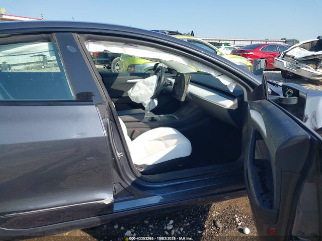2023 TESLA MODEL 3 5YJ3E1EA7PF606882 Photo 4
