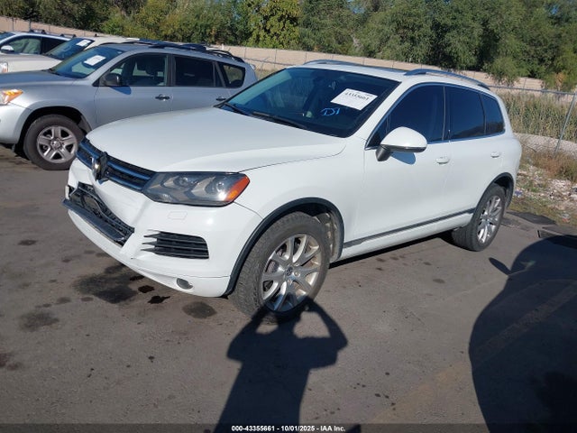 2014 VOLKSWAGEN TOUAREG WVGEP9BPXED012958 Photo 1