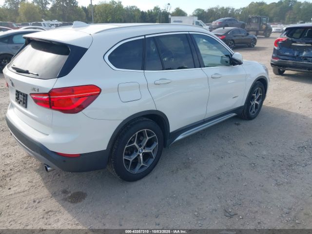2017 BMW X1 WBXHT3C32H5F80843 Photo 3