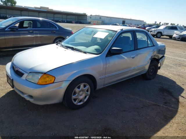 1999 MAZDA PROTEGE JM1BJ2223X0149383 Photo 1