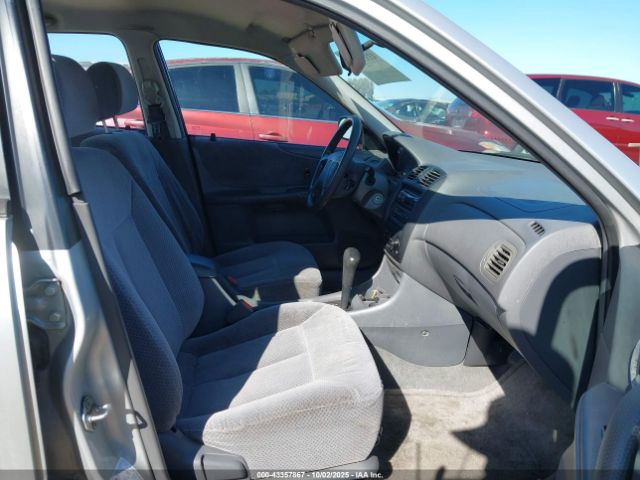 1999 MAZDA PROTEGE JM1BJ2223X0149383 Photo 4