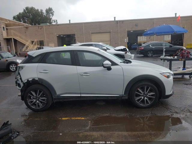 JM1DKFD70G0130201 Mazda pe