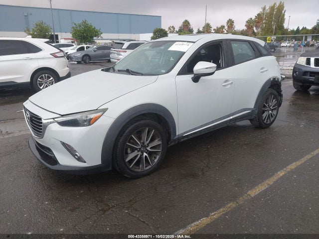 Mazda pe 2016 JM1DKFD70G0130201 Image 2