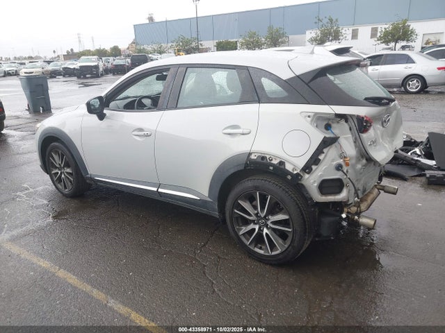 Mazda pe 2016 JM1DKFD70G0130201 Image 3