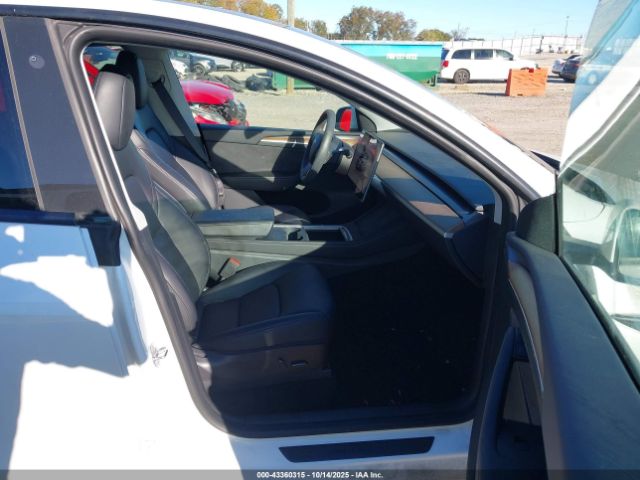 2023 TESLA MODEL Y 7SAYGDEE9PF702861 Photo 4