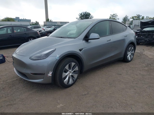 2024 TESLA MODEL Y 7SAYGDEE2RA290105 Photo 1