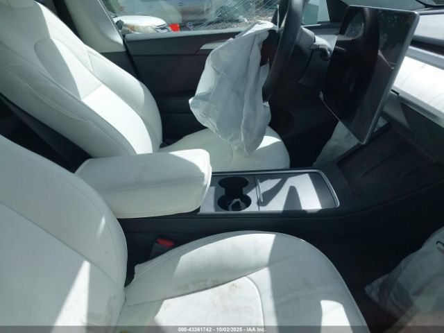 2023 TESLA MODEL Y 7SAYGDEF0PF601457 Photo 4