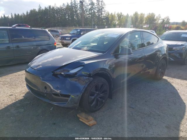 2024 TESLA MODEL Y 7SAYGDED3RF183932 Photo 1