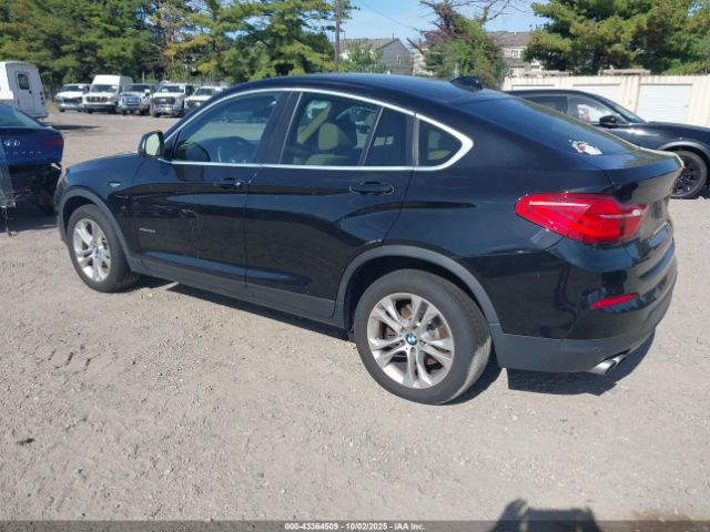 2015 BMW X4 5UXXW3C5XF0M88645 Photo 2