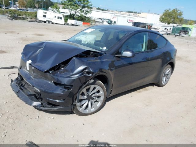 2026 TESLA MODEL Y 7SAYGDEE4TF332834 Photo 1