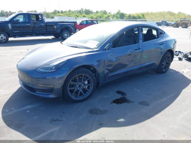 2023 TESLA MODEL 3 5YJ3E1EA5PF676266 Photo 1
