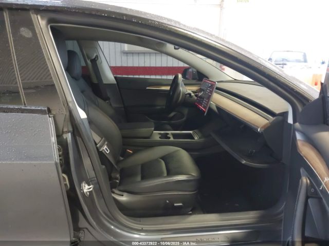 2023 TESLA MODEL 3 5YJ3E1ECXPF712261 Photo 4