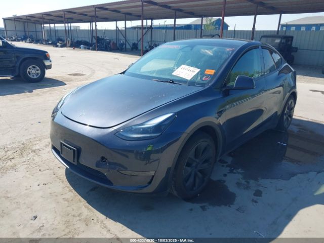 2024 TESLA MODEL Y 7SAYGDEE3RA317084 Photo 1
