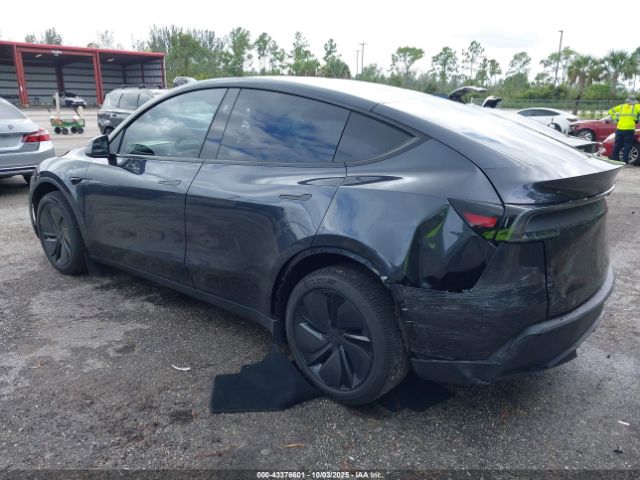 2026 TESLA MODEL Y 7SAYGDEEXTA442834 Photo 2