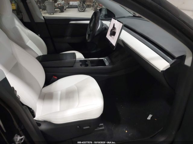 2023 TESLA MODEL Y 7SAYGDEF3PF772445 Photo 4