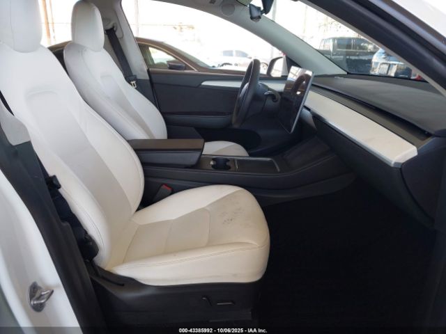 2023 TESLA MODEL Y 7SAYGDEE1PF627623 Photo 4