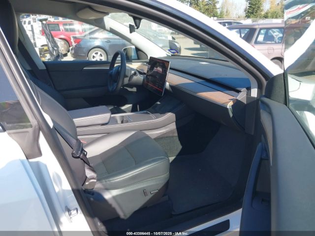 2023 TESLA MODEL Y 7SAYGDEE7PA101283 Photo 4