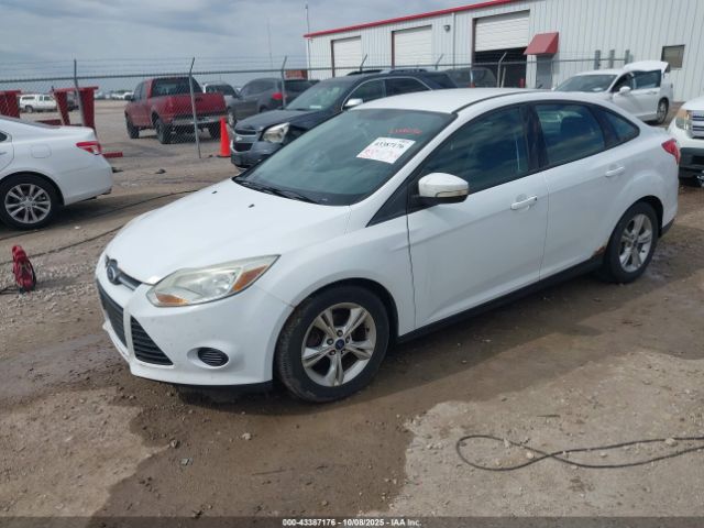 2014 FORD FOCUS 1FADP3F28EL232235 Photo 1