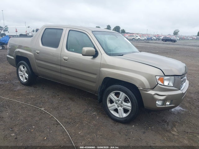 2011 HONDA RIDGELINE 5FPYK1F54BB009978