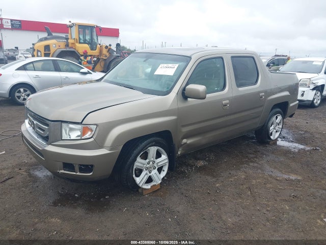 2011 HONDA RIDGELINE 5FPYK1F54BB009978 Photo 1