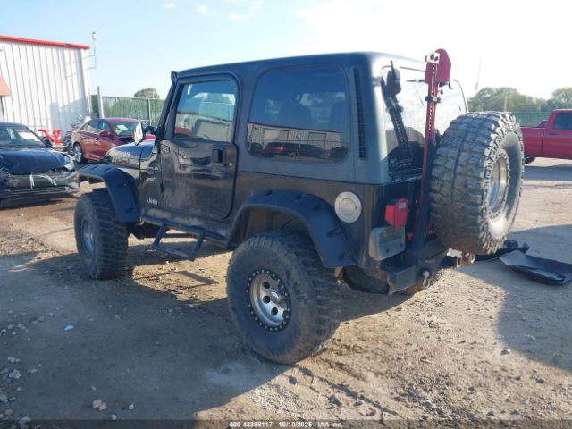 2000 JEEP WRANGLER 1J4FA49S2YP752332 Photo 2