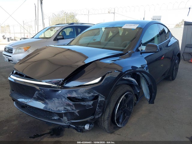 2026 TESLA MODEL Y 7SAYGDED5TF443643 Photo 5