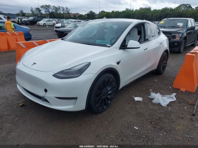 2022 TESLA MODEL Y 7SAYGDEF6NF516748 Photo 1