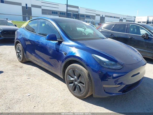 2024 TESLA MODEL Y 7SAYGDEDXRA309703 Photo 0