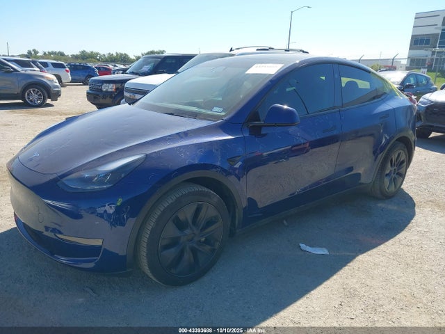 2024 TESLA MODEL Y 7SAYGDEDXRA309703 Photo 1