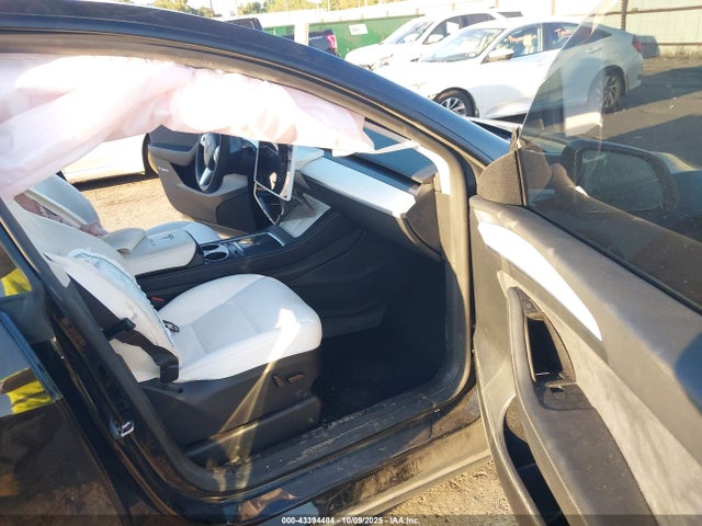 2023 TESLA MODEL Y 7SAYGAEE0PF861752 Photo 4